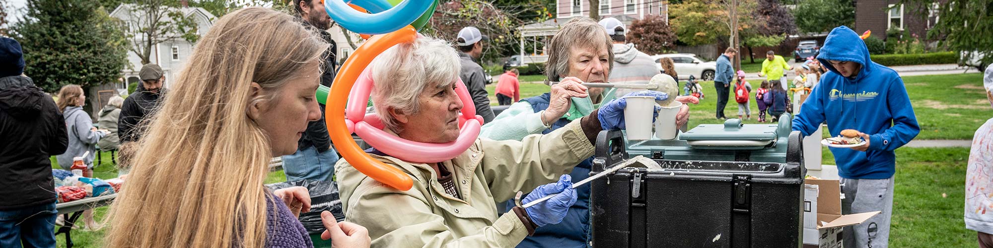 Block Party volunteers ladle up bowls of chowder