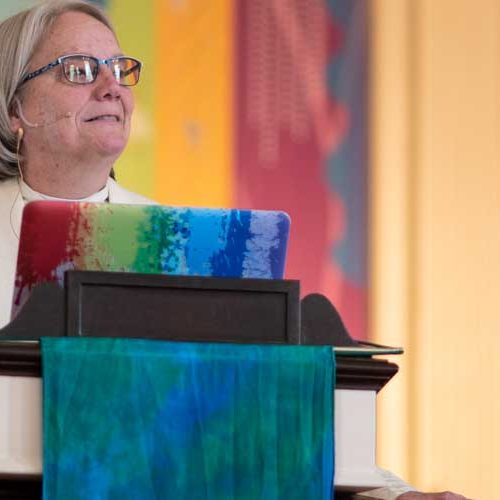 East Church's Pastor Shelly Davis, behind pulpit