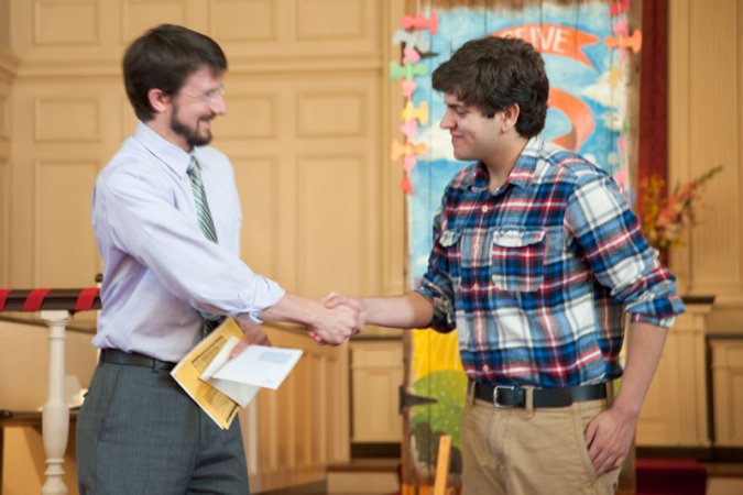 Zack accepts scholarship.