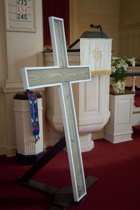 The Easter cross starts out stark and bleak.