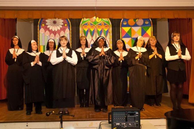 The Singing Nuns of East Church made a triumphant return, presenting a rousing finale act.