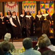 The Singing Nuns of East Church made a triumphant return, presenting a rousing finale act.