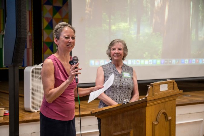 Sharon Gallagher and Vicki Nelson spoke of Shelly's leadership during the consolidation process.