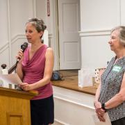 Sharon Gallagher and Vicki Nelson spoke of Shelly's leadership during the consolidation process.
