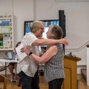 Sharon Gallagher and Vicki Nelson spoke of Shelly's leadership during the consolidation process.