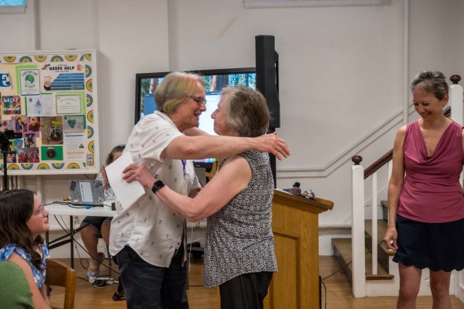 Sharon Gallagher and Vicki Nelson spoke of Shelly's leadership during the consolidation process.