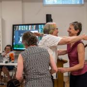 Sharon Gallagher and Vicki Nelson spoke of Shelly's leadership during the consolidation process.