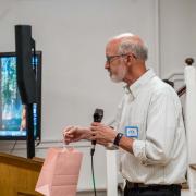 Mike Maholchic delivered a poem he wrote for Shelly.