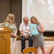 Beth Olson's involvement was recognized as well as Shelly's.