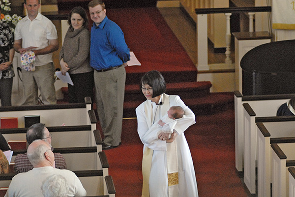 Ella Grace is presented to the congregation
